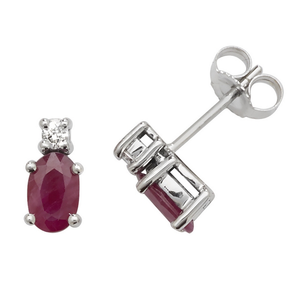 Oval Shaped Ruby And Diamond Stud Earrings In 9ct White Gold Oval Shaped Ruby And Diamond Stud Earrings In 9ct White Gold