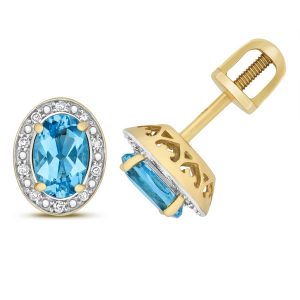 Diamond and Oval Cut Blue Topaz Stud Earrings in 9ct Yellow Gold
