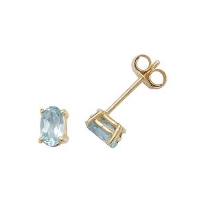 Solitaire Oval Blue Topaz Stud Earrings in 9ct Yellow Gold