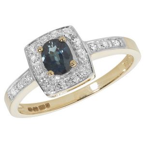 Diamond and Oval Shaped Sapphire Set 9ct Yellow Gold Ring with Diamond Set Shoulders