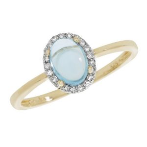 Blue Topaz Oval Shaped Cabochon and Diamond Dress Ring in 9ct Yellow Gold