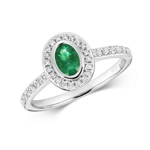 Diamond and Oval Emerald Rubover Style Ring with Diamond Set Shoulders in 9ct White Gold