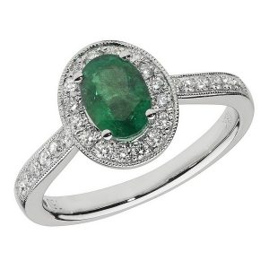 Diamond and Oval Shaped Emerald Cluster Ring with Diamond Shoulders in 18ct White Gold